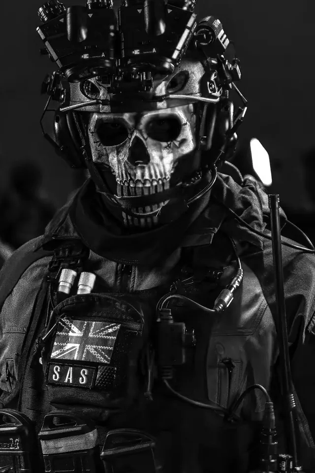 Soldier in a skull mask and night-vision helmet