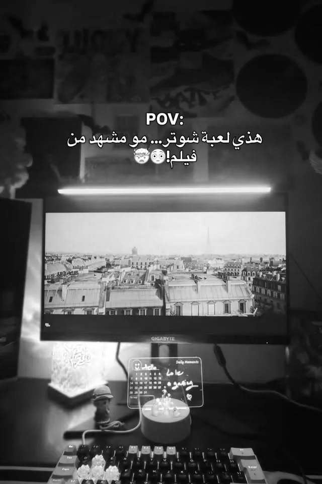 Gaming desk with the game on screen